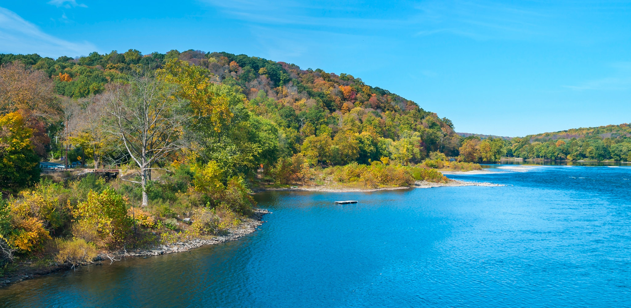 A panoramic view of the Delaware River on a early Fall day in Pennsylvania.